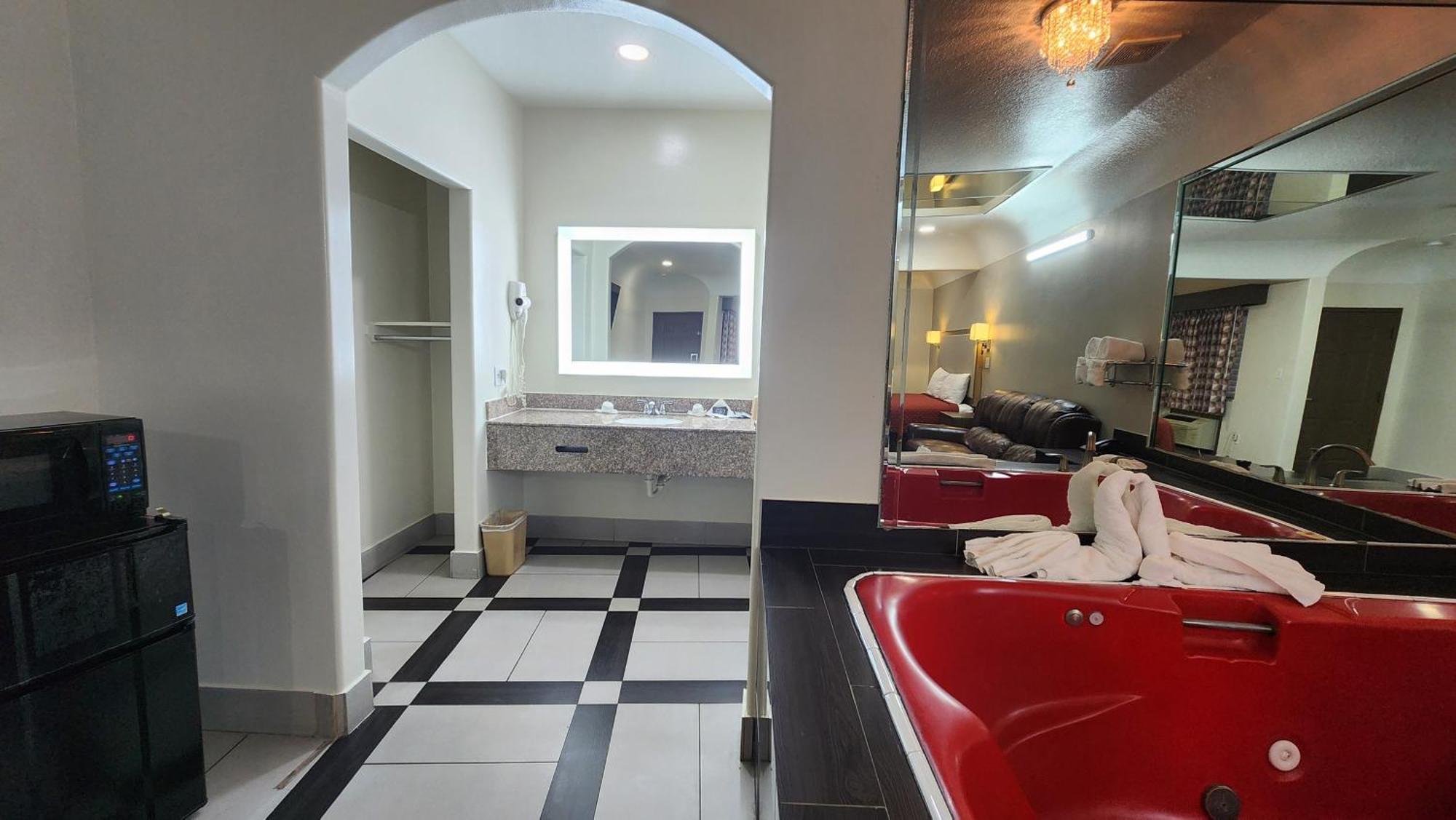 Scottish Inn & Suites Sam Houston Parkway Esterno foto