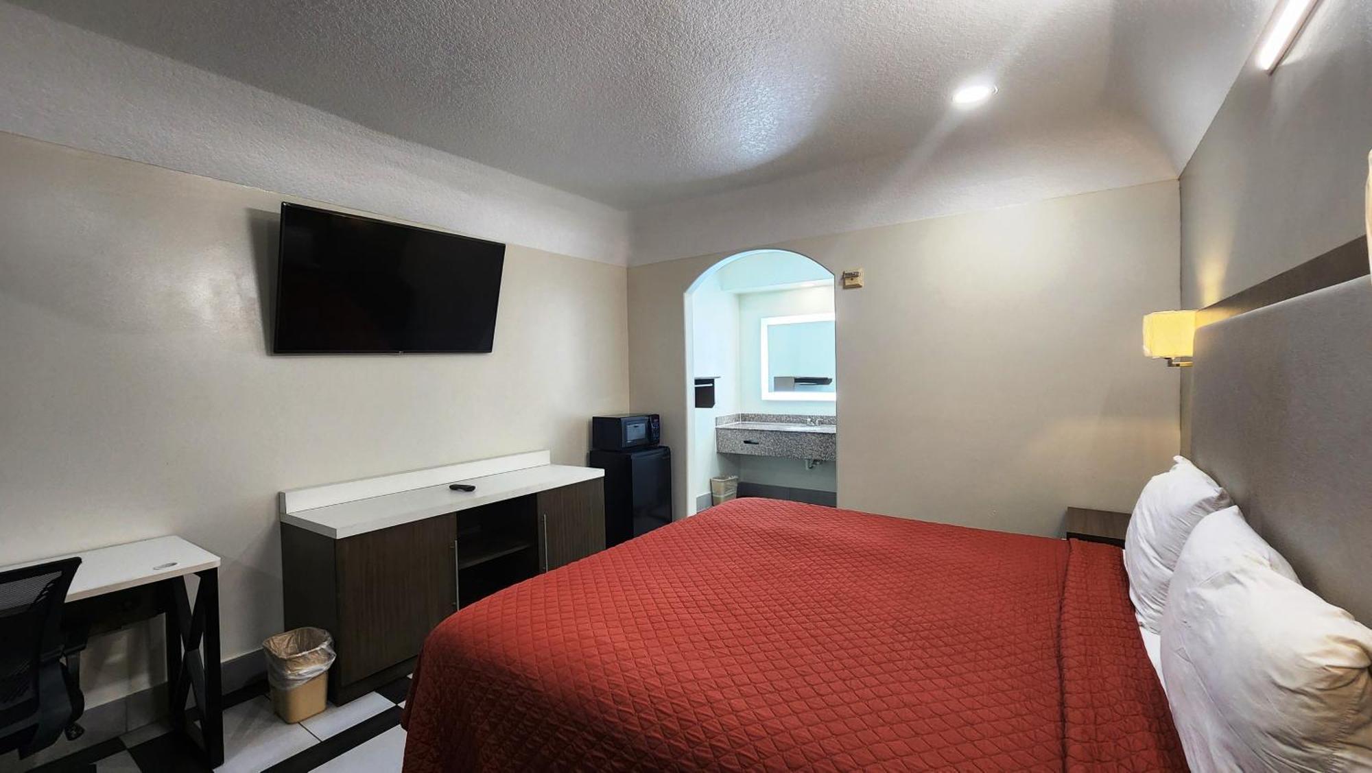Scottish Inn & Suites Sam Houston Parkway Esterno foto
