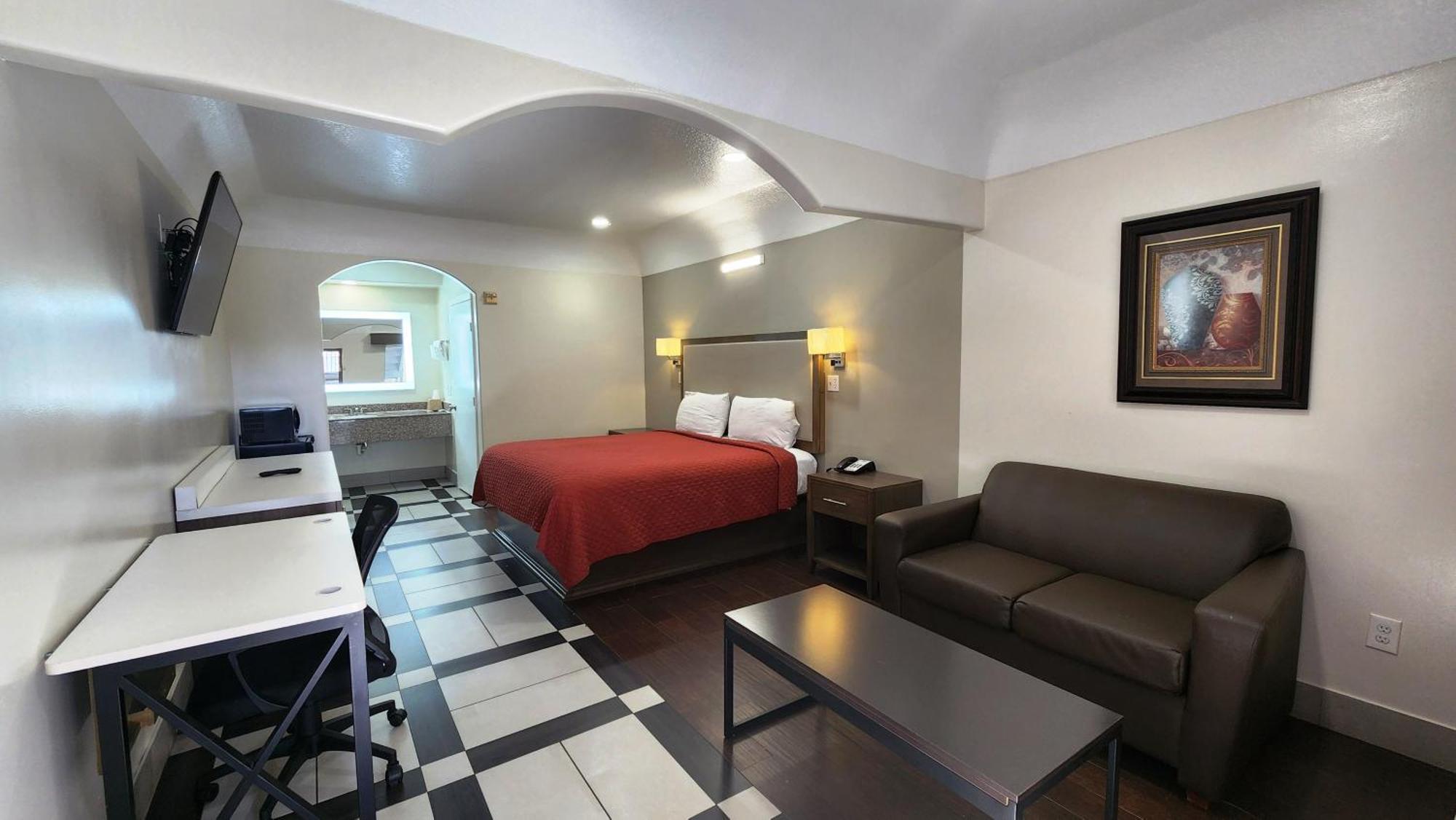 Scottish Inn & Suites Sam Houston Parkway Esterno foto