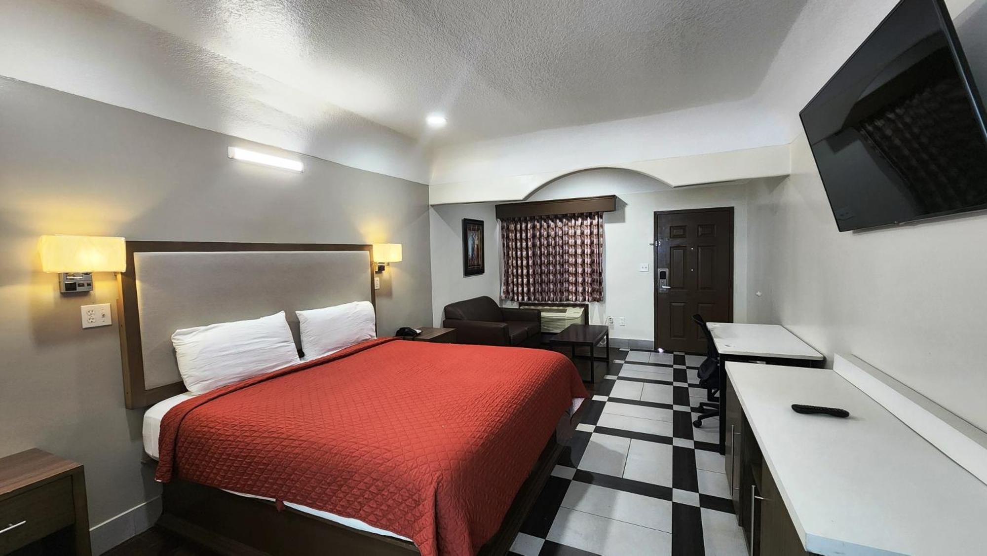 Scottish Inn & Suites Sam Houston Parkway Esterno foto